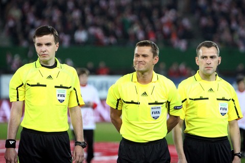 a referee and linesmen